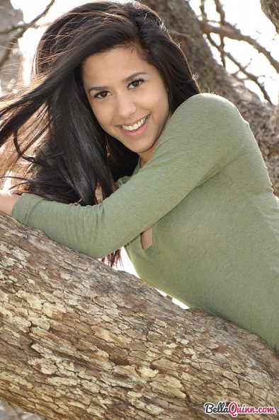 bella quinn teases and poses in the tree 7