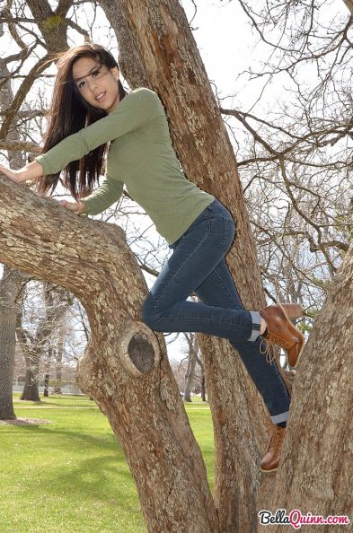bella quinn teases and poses in the tree 8